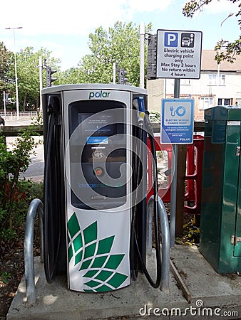 A close up of the charging bowser at an electric vehicle charging point Editorial Stock Photo