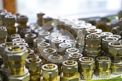 Chelyabinsk Region, Russia - JUNE 2019. Plumbing sales. Rack with goods. Some metal valves and fittings on a shelf in a workshop Editorial Stock Photo