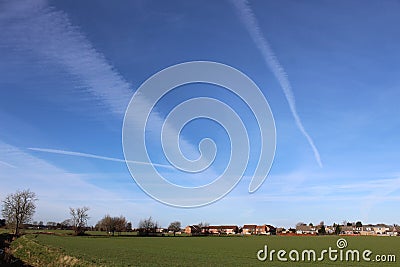 Chem trails or condensation trails over Yorkshire Stock Photo