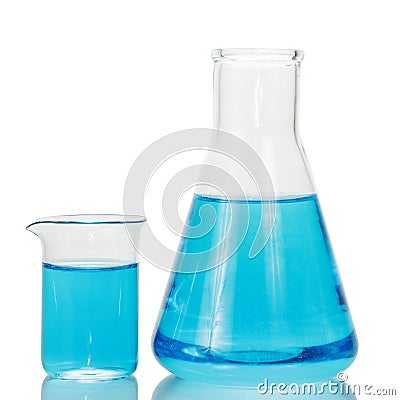A chemical flask and beaker with blue liquids isolated on white Stock Photo