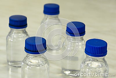 Chemical glassware for storing chemicals and solution. spheres of application - medicine, chemistry, health care, water supply, Stock Photo