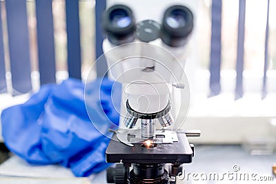 Chemical laboratory microscope, tools and gadgets. Scientific and health care equipment Stock Photo