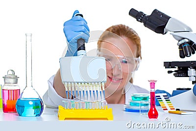 Chemical laboratory scientist woman multi channel pipette Stock Photo