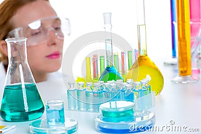 Chemical laboratory scientist woman with test tubes Stock Photo
