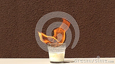 A chemical reaction mixes brake fluid and pool chlorine. Concept of chemical reaction about spontaneous combustion Stock Photo