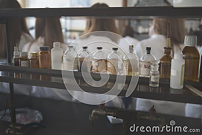 Chemicals and laboratory utensils.Vintage pharmacy bottles on wooden board.Chemical bottles for use on chemistry class.Safe chemic Stock Photo