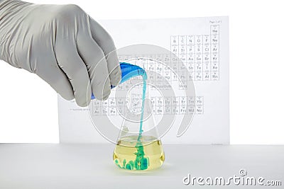 Chemist mixes chemicals Stock Photo