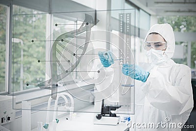 Chemist in protective suit working with futuristic interface wit Stock Photo