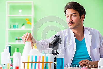 The chemist testing soap in the lab Stock Photo