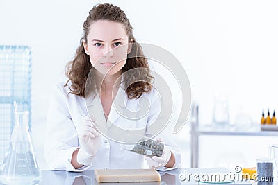 Chemist in white uniform Stock Photo