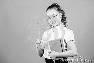 Chemistry lesson. Educative experiment. Chemistry fun. Knowledge day. Schoolgirl with colorful chemical liquids. Having Stock Photo
