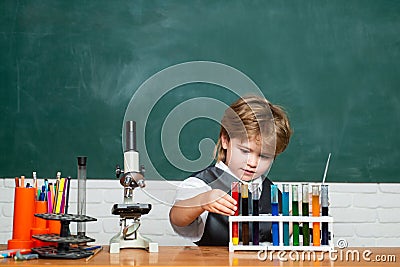 Chemistry lesson. School chemistry lessons. First grade. Little children at school lesson. Education. Back to school and Stock Photo