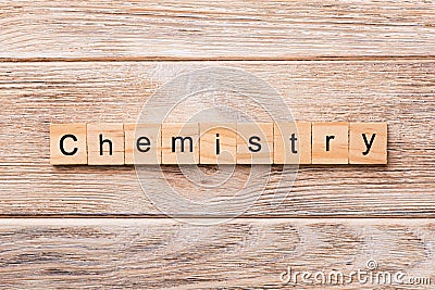 Chemistry word written on wood block. Chemistry text on wooden table for your desing, concept Stock Photo