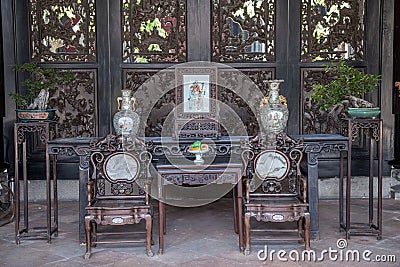 Chen Clan Academy, a famous tourist attraction in Guangdong, China, is the furniture of Ming and Qing Dynasties, which is displaye Editorial Stock Photo