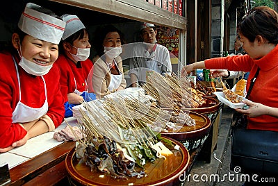 Chengdu, China: Food Vendors on Jin Li Street Editorial Stock Photo