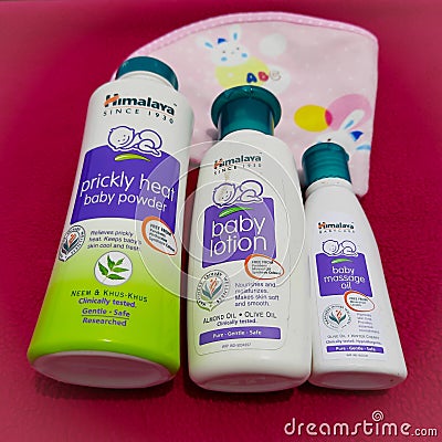 Chennai, India - July 4 2020: Baby Himalaya products placed beautifully in dark pink background and for smooth and soft skin Editorial Stock Photo
