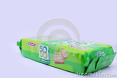 Beautiful view of Britannia Crackers 50-50 Sweet & Salty Cookies or biscuit in a green cover pack Editorial Stock Photo