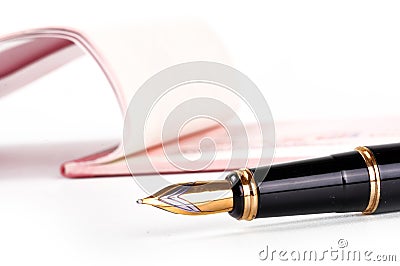 Cheque with pen Stock Photo