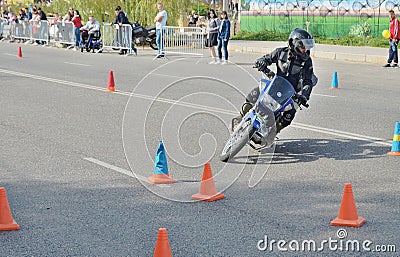 Girl on Yamaha Motorbike around Obstacle Editorial Stock Photo