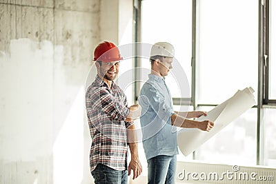 Cherrful architect is going to finish the great task Stock Photo