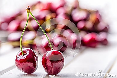 Cherries. Sweet Cherries. Fresh Cherries. Ripe cherries on wooden concrete table - board Stock Photo