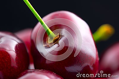 Cherry closeup. Organic ripe cherries isolated on black Stock Photo