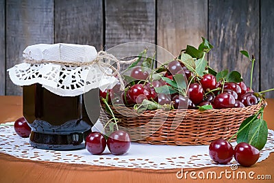 Cherry jam jar and fresh cherries Stock Photo