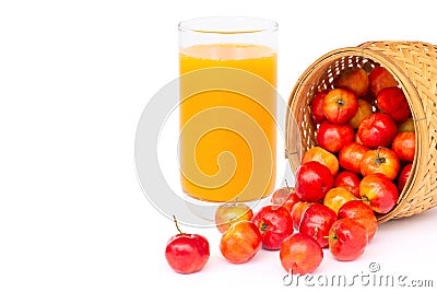 Glass of acerola juice and acerola cherry fruit isolated on white. Stock Photo