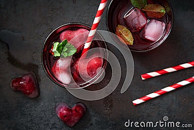 Cherry mint cocktail with vodka on a dark background. Top view Stock Photo