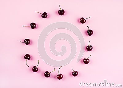 Cherry pattern frame on pink background Stock Photo