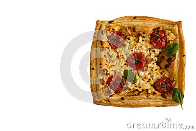 Cherry tomatoes and feta cheese tart made with butter puff pastry. Isolated on white, top view Stock Photo