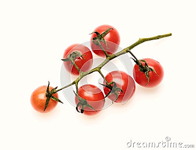 Cherry tomatoes isolated on white background. Bunch of tomatoes, top view. Tomato branch in juicy red color. Vegetables Stock Photo