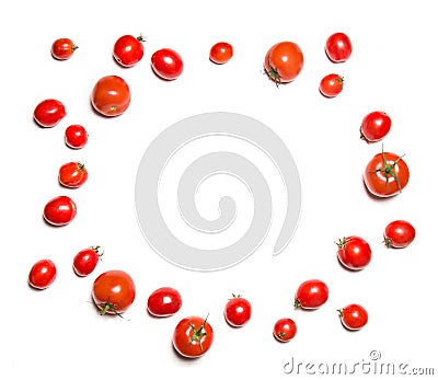 Cherry tomatoes isolated on white top view in shape of circle. Round vegetable frame. Stock Photo