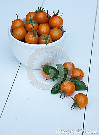 Cherry tomatoes in a white bowl Stock Photo