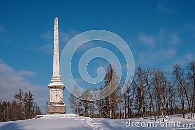 Chesma obelisk in Gatchina Park. Sunny winter`s day. Stock Photo