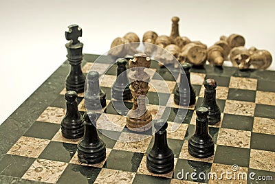 Surrounded Sovereign: Awaiting Fate [Chess] Stock Photo