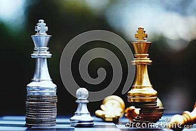 Chess board game, business competitive concept, strong financial capital advantage situation against unstable finance team Stock Photo