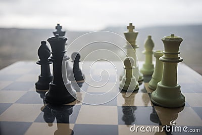 chess board game concept of business ideas and competition and strategy ideas. Chess figures on a chessboard outdoor sunset Stock Photo