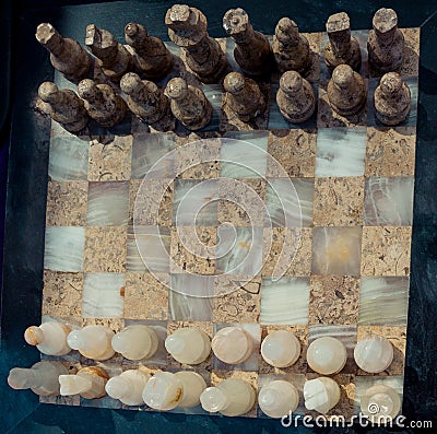 Chess board with marble chess pieces Stock Photo