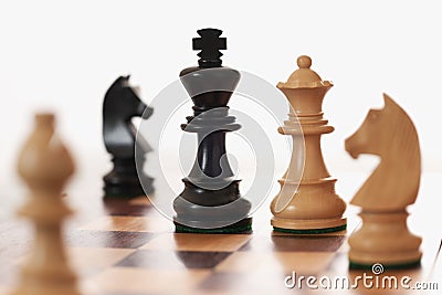 Chess game white queen challenging black king Stock Photo