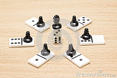 Chess horse stands on the top of dice Stock Photo