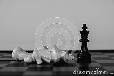Chess King stand as last winner, victory over the enemies. The winner in business competition. Competitiveness and strategy Stock Photo