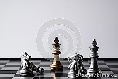 Chess King stand over the enemies. The winner in business competition. Competitiveness and strategy. Copy space Stock Photo