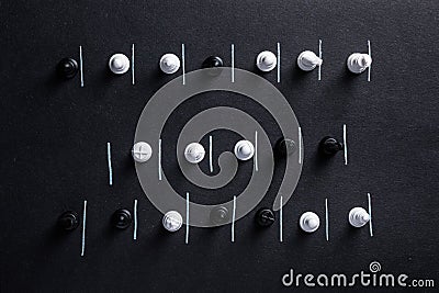 Chess pieces on a dark background with constraint lines Stock Photo