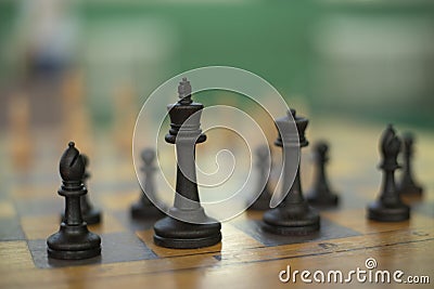 Chess pieces on table. Chess Tournament. Ancient Strategy Stock Photo