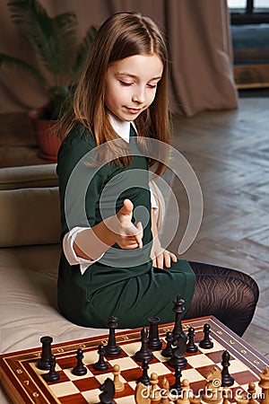 Chess player schoolgirl Stock Photo