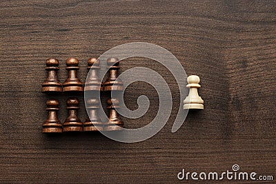 Chess uniqueness concept over grey background Stock Photo