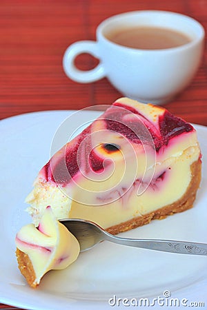 Chesse and raspberry cream cake & a cup of coffee Stock Photo