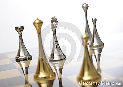 Chessboard with knight in focus Stock Photo