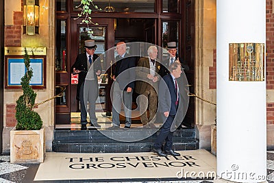 CHESTER, ENGLAND - JUNE 26TH, 2019: The entrance of the Chester Grosvenor with the doormen and tourists in the shot Editorial Stock Photo